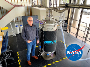 GenH2 cofounder James Fesmire stands next to the Cryostat CS900, the latest and most capable device in his series of cryostats, most of which he originally developed for NASA’s Kennedy Space Center. Credit: GenH2 Corp.